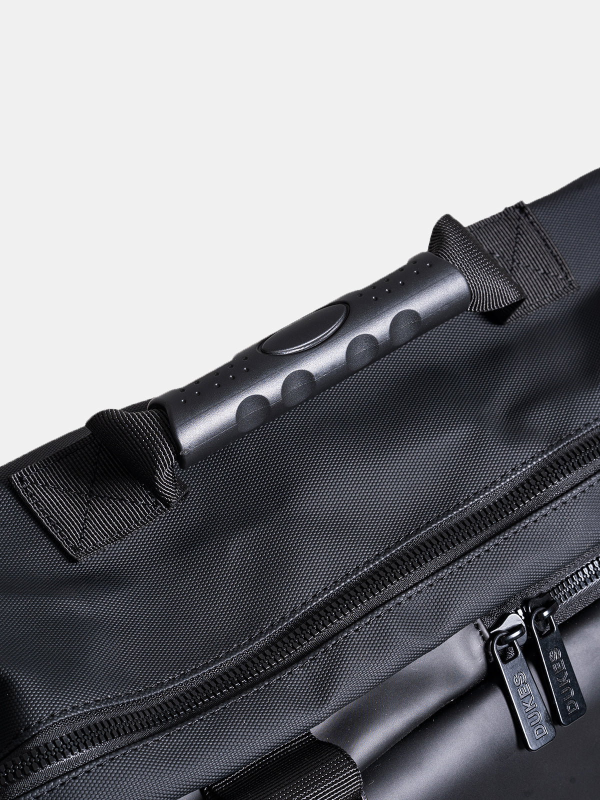 NOMAD waterproof bag zipper closure detail — anti-theft Oxford fabric